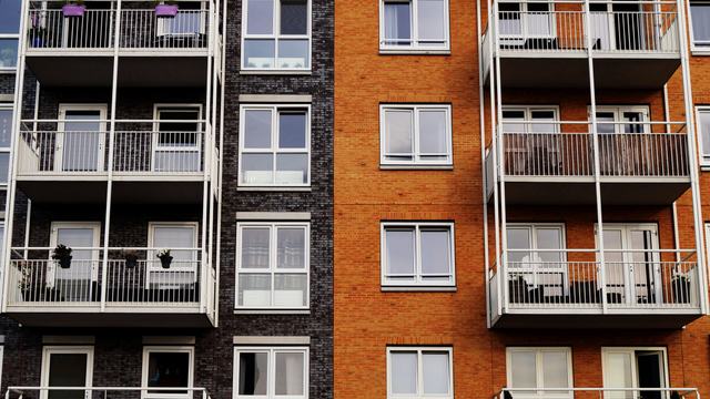 A block of residential investment properties on a quiet street.